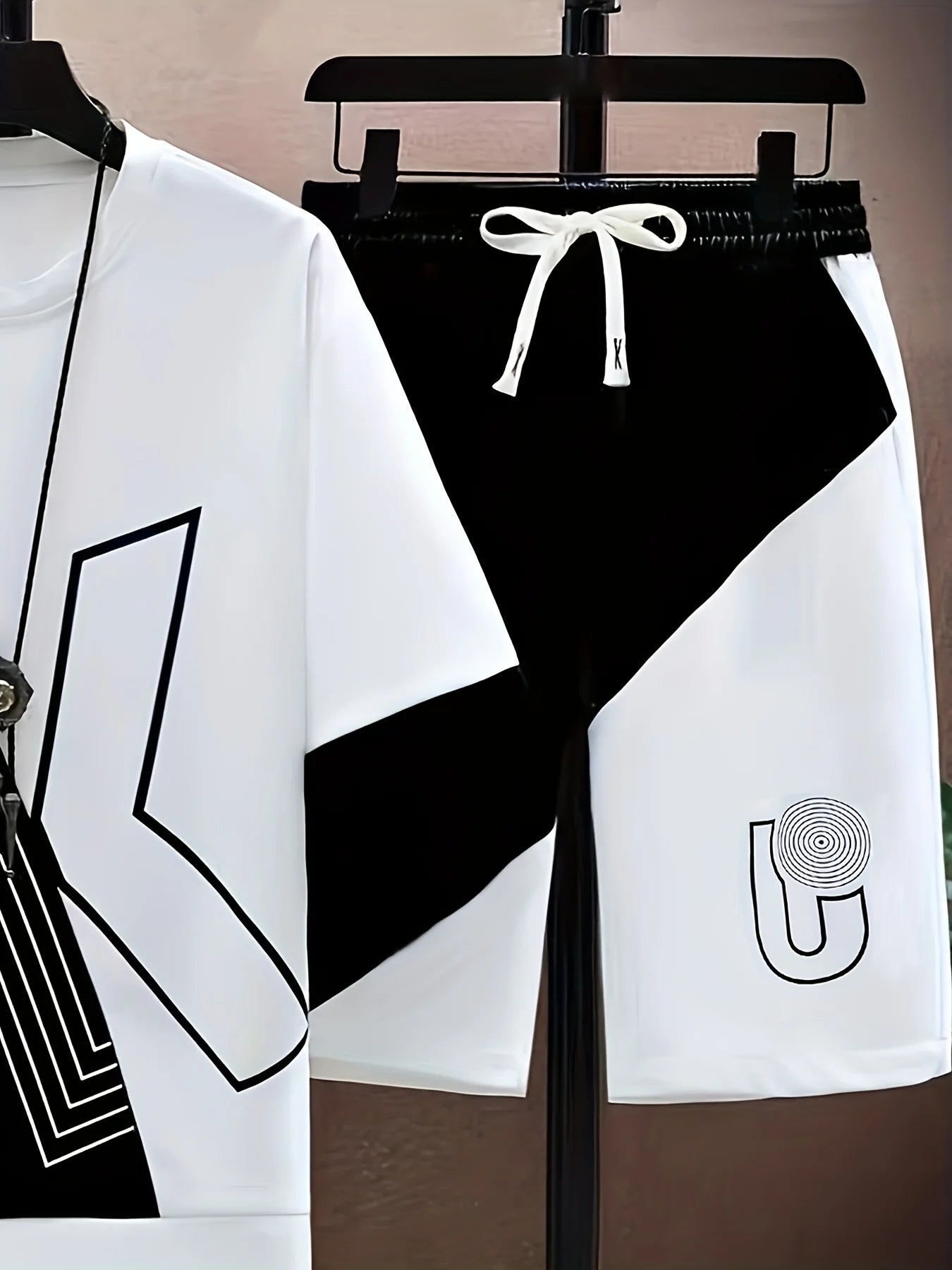 The new men's set for summer 2025 is stylish and cool with 3D printed letters It is lightweight breathable soft and comfortable